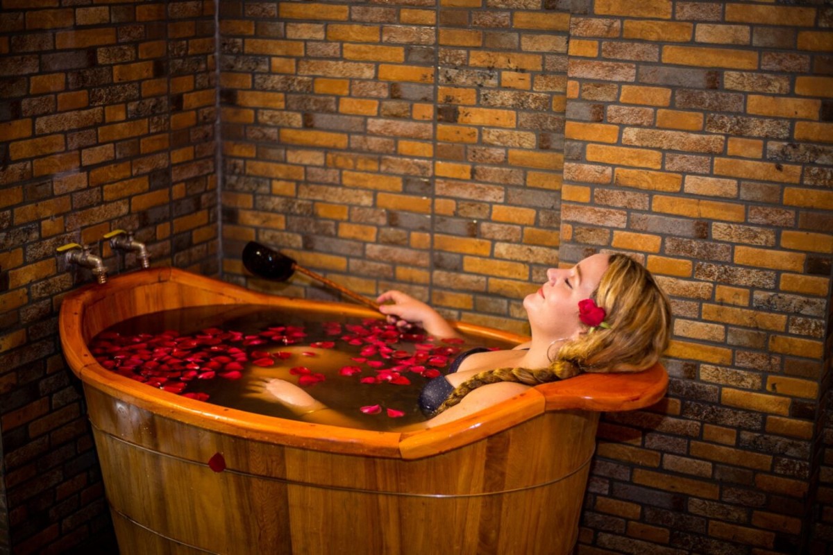 End your day the local way with a warm, fragrant herbal bath in a mountain village