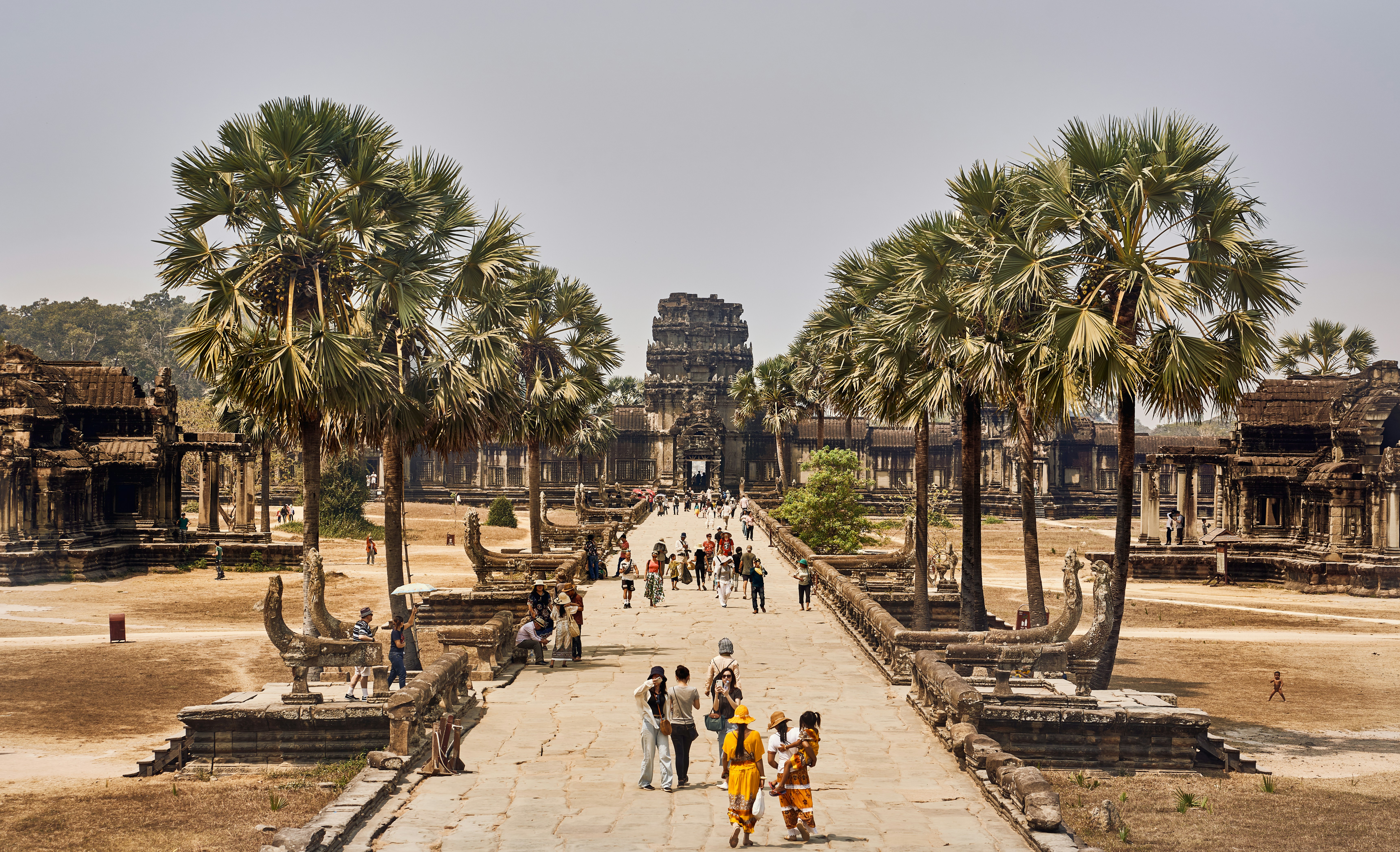 Lush greenery and quiet pathways surround Angkor Wat in the off-season beauty of September