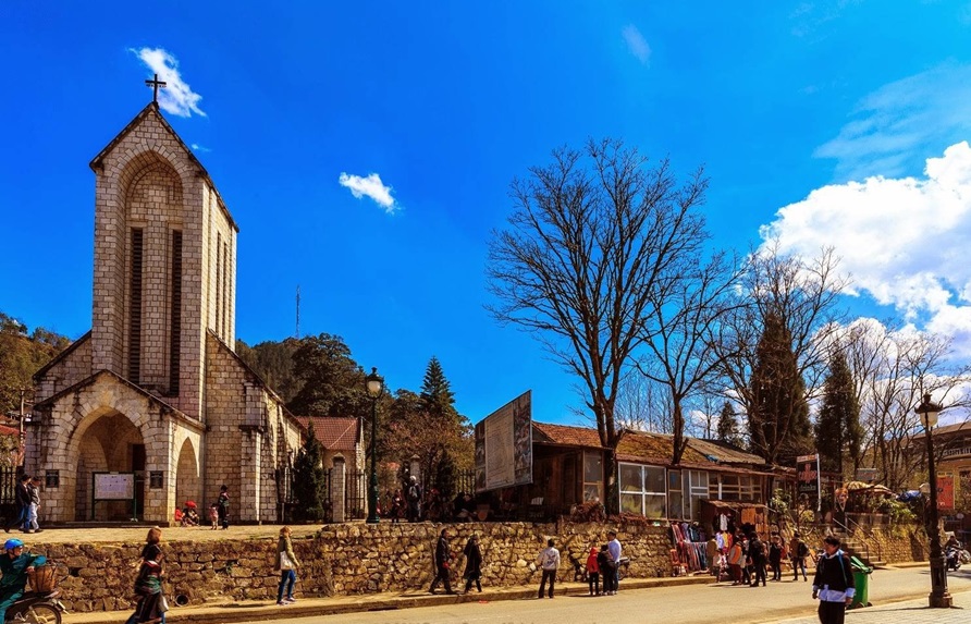 Visit the Sapa Market and Stone Church for a perfect mix of history, heritage, and daily life